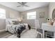 This bedroom features a writing desk and a bright window at 105 Bonita Pl, Ormond Beach, FL 32174