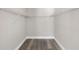 Walk-in closet with sleek gray floors and neutral walls at 105 Bonita Pl, Ormond Beach, FL 32174