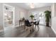 Bright dining room features modern decor, gray floors, and natural light at 105 Bonita Pl, Ormond Beach, FL 32174