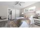 Relaxing primary bedroom featuring lots of natural light and a private en suite bathroom at 105 Bonita Pl, Ormond Beach, FL 32174