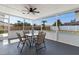 This covered patio offers a backyard view and dining and lounge area at 105 Bonita Pl, Ormond Beach, FL 32174