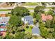 Aerial view of the house surrounded by lush green trees at 1221 Gamble Pl, Daytona Beach, FL 32118