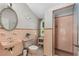 Retro bathroom with vintage tile, sink, and shower at 1221 Gamble Pl, Daytona Beach, FL 32118