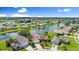 Charming home featuring mature landscaping and waterfront views from lush residential area at 1904 Rouzbeh Ct, Port Orange, FL 32128