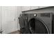 Laundry room featuring modern LG washer and dryer units with tile flooring at 1904 Rouzbeh Ct, Port Orange, FL 32128