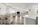 Bright, open-concept living area with dining space, and lots of natural light at 1904 Rouzbeh Ct, Port Orange, FL 32128