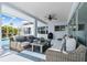 Spacious covered patio featuring comfortable seating, perfect for outdoor relaxation at 1904 Rouzbeh Ct, Port Orange, FL 32128