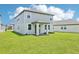 Expansive backyard with lush green lawn, perfect for outdoor activities and relaxation at 288 Links Terrace Blvd, Daytona Beach, FL 32124