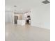 Bright, airy living room with tile flooring, sliding glass doors to the yard, and modern design at 288 Links Terrace Blvd, Daytona Beach, FL 32124