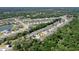 Aerial view of the community, showing tree-lined streets and well-maintained properties at 3029 Adrian Dr, Ormond Beach, FL 32174
