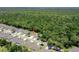 Aerial view showing the home in relation to the surrounding neighborhood and green space at 3029 Adrian Dr, Ormond Beach, FL 32174