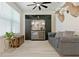 This bar features dark walls, two coolers, wine storage, a mirror, and mounted animal heads at 3029 Adrian Dr, Ormond Beach, FL 32174