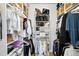 Walk-in closet offering ample storage space with built-in shelves and hanging rods at 920 N Lakewood Ter, Port Orange, FL 32127