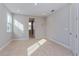 Spacious bedroom with recessed lighting, neutral carpet, and an open doorway to the en-suite at 9762 Neruda St, Orlando, FL 32827