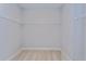 Walk-in closet provides ample storage space with shelving at 9762 Neruda St, Orlando, FL 32827