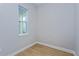 Bright bonus room with light walls, wood floor and plenty of natural light at 9762 Neruda St, Orlando, FL 32827