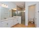 Large bathroom boasting double vanity and walk-in shower at 10185 Pearson Ave, Orlando, FL 32827