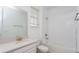 Clean bathroom with white tile, bathtub, and vanity at 10185 Pearson Ave, Orlando, FL 32827