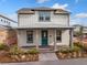 Two-story home with a covered front porch and landscaped yard at 10185 Pearson Ave, Orlando, FL 32827