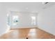 Spacious living room with hardwood floors and recessed lighting at 10185 Pearson Ave, Orlando, FL 32827
