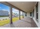 Spacious covered porch overlooking the neighborhood at 10185 Pearson Ave, Orlando, FL 32827