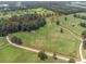 Aerial view of land boundaries, highlighting the expansive green fields and tree coverage at 1951 Nw 114Th Loop, Ocala, FL 34475