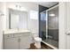 Modern bathroom with gray tile shower and vanity at 13438 Leggett Aly, Orlando, FL 32827