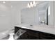 Bathroom with single vanity, dark brown cabinets and white countertop at 13438 Leggett Aly, Orlando, FL 32827