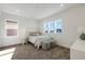 Bedroom with a queen bed, side tables, and window views at 13438 Leggett Aly, Orlando, FL 32827