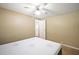 Bedroom with ceiling fan and ample closet space at 2734 Vindale Rd, Tavares, FL 32778