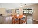 Dining area with wood table and chairs, near kitchen at 2734 Vindale Rd, Tavares, FL 32778