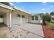 Charming single-story home with a covered porch and well-maintained front yard at 2734 Vindale Rd, Tavares, FL 32778