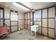 Unfinished laundry area with utility sink and ample space at 2734 Vindale Rd, Tavares, FL 32778