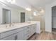 Elegant bathroom with double vanity and walk-in shower at 13200 Peaceful Melody Dr, Winter Garden, FL 34787