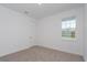 Well-lit bedroom with window and neutral decor at 13200 Peaceful Melody Dr, Winter Garden, FL 34787