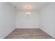 Simple dining room with hardwood floors and chandelier at 13200 Peaceful Melody Dr, Winter Garden, FL 34787