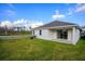 Single story home with backyard and covered patio at 13200 Peaceful Melody Dr, Winter Garden, FL 34787