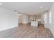Open concept living space with kitchen and dining area visible at 13200 Peaceful Melody Dr, Winter Garden, FL 34787