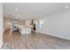 Open concept living area with kitchen and dining room at 13200 Peaceful Melody Dr, Winter Garden, FL 34787