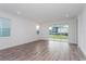 Spacious living area with sliding doors leading to the backyard at 13200 Peaceful Melody Dr, Winter Garden, FL 34787