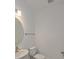 Small bathroom with toilet and sink at 13230 Peaceful Melody Dr, Winter Garden, FL 34787