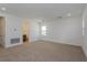 Well-lit bedroom with adjacent bathroom and window at 13230 Peaceful Melody Dr, Winter Garden, FL 34787