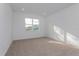 Bright bedroom with carpet flooring and large window at 13230 Peaceful Melody Dr, Winter Garden, FL 34787