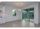 Bright dining area with sliding glass doors to patio at 13230 Peaceful Melody Dr, Winter Garden, FL 34787