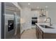 Stainless steel refrigerator in a modern kitchen setting at 13230 Peaceful Melody Dr, Winter Garden, FL 34787