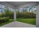Covered patio overlooking backyard at 13230 Peaceful Melody Dr, Winter Garden, FL 34787