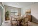 Beautiful dining room featuring elegant decor and a large window for natural light at 2720 Dumont Ln, Tavares, FL 32778