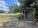 Chicken coop with wire enclosure and plants at 21342 S Buckhill Rd, Clermont, FL 34715