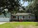 One-story home with attached garage and front porch at 21342 S Buckhill Rd, Clermont, FL 34715