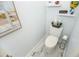 Clean and modern half bathroom with marble flooring at 4624 Harbour Village Bv # 4205, Ponce Inlet, FL 32127